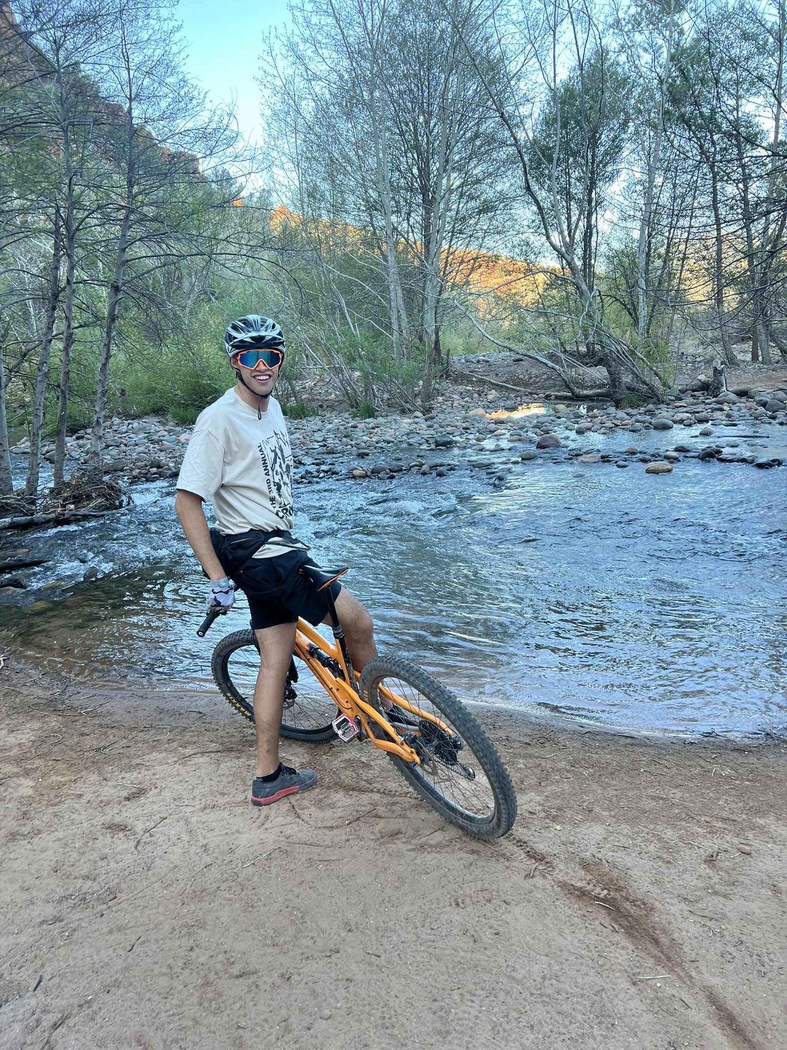 a group of children sitting on steps in front of a building