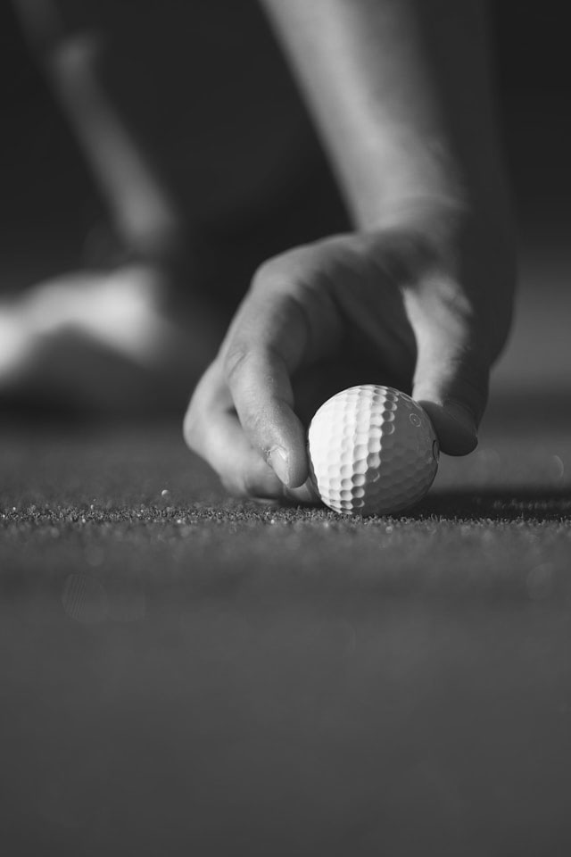 Yellow taxi with open door on a city street