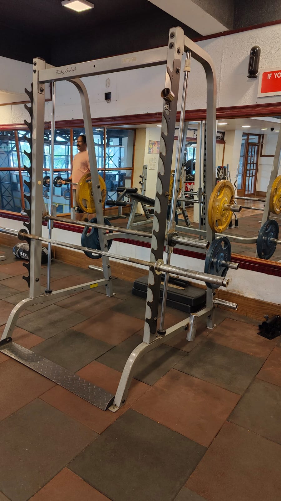 Man lifting weights during workout