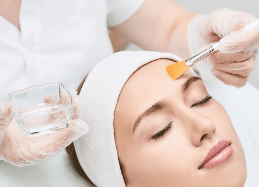 A man's back with water drops on it