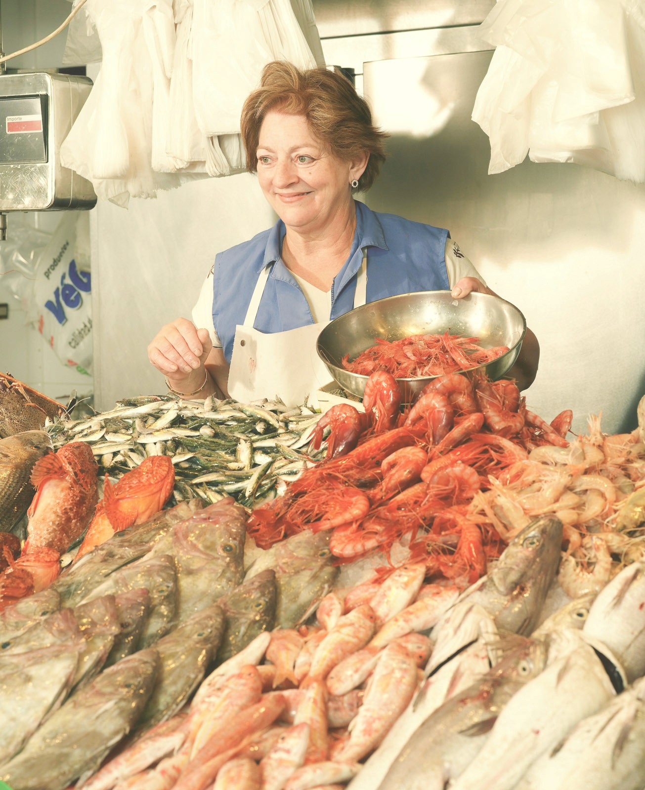 blue and white painted houses on the cliff