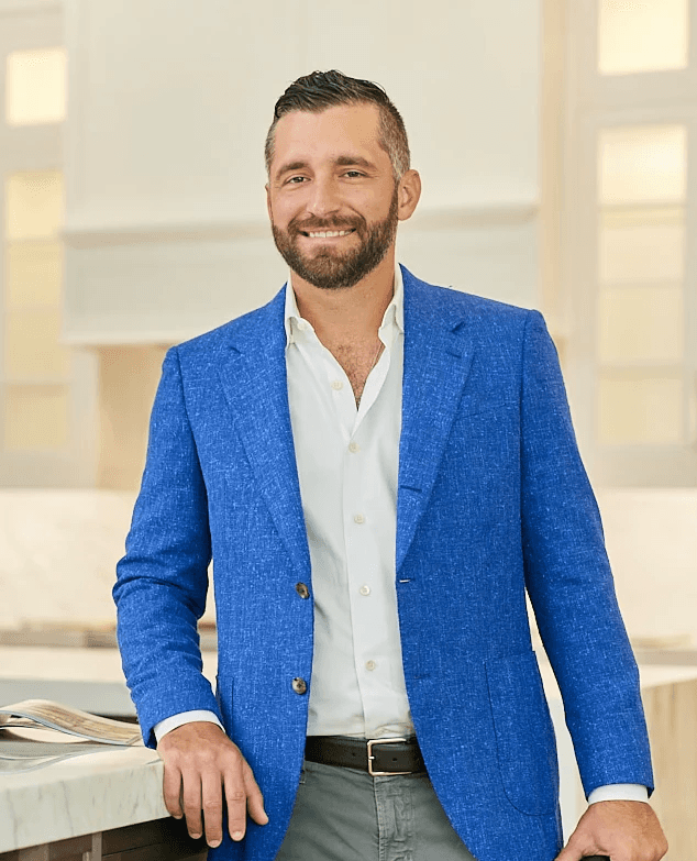 Naples real estate agent Vince Branda standing inside a luxury Naples home