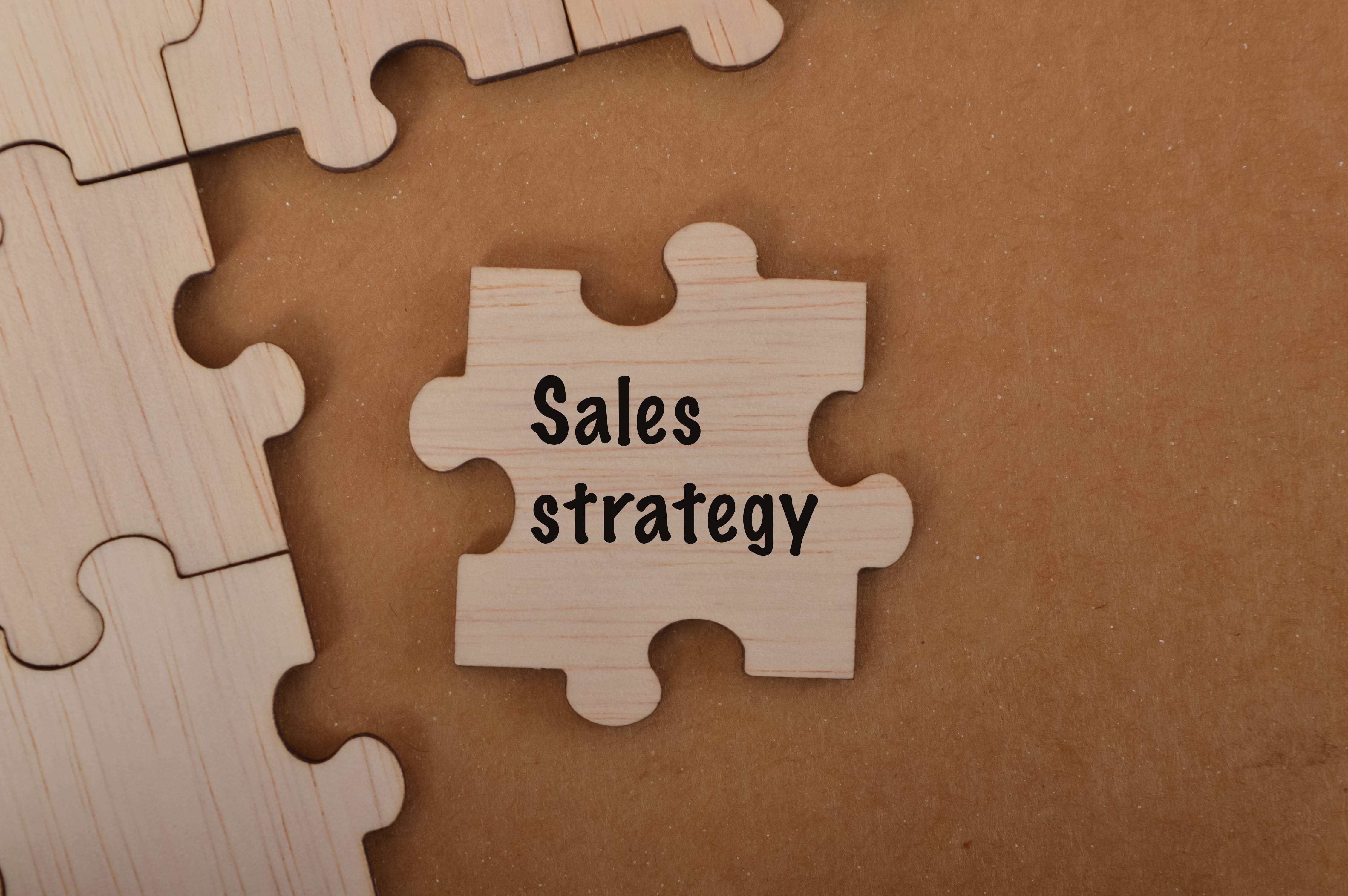 Sales strategy puzzle piece symbolizing marketing and business growth planning