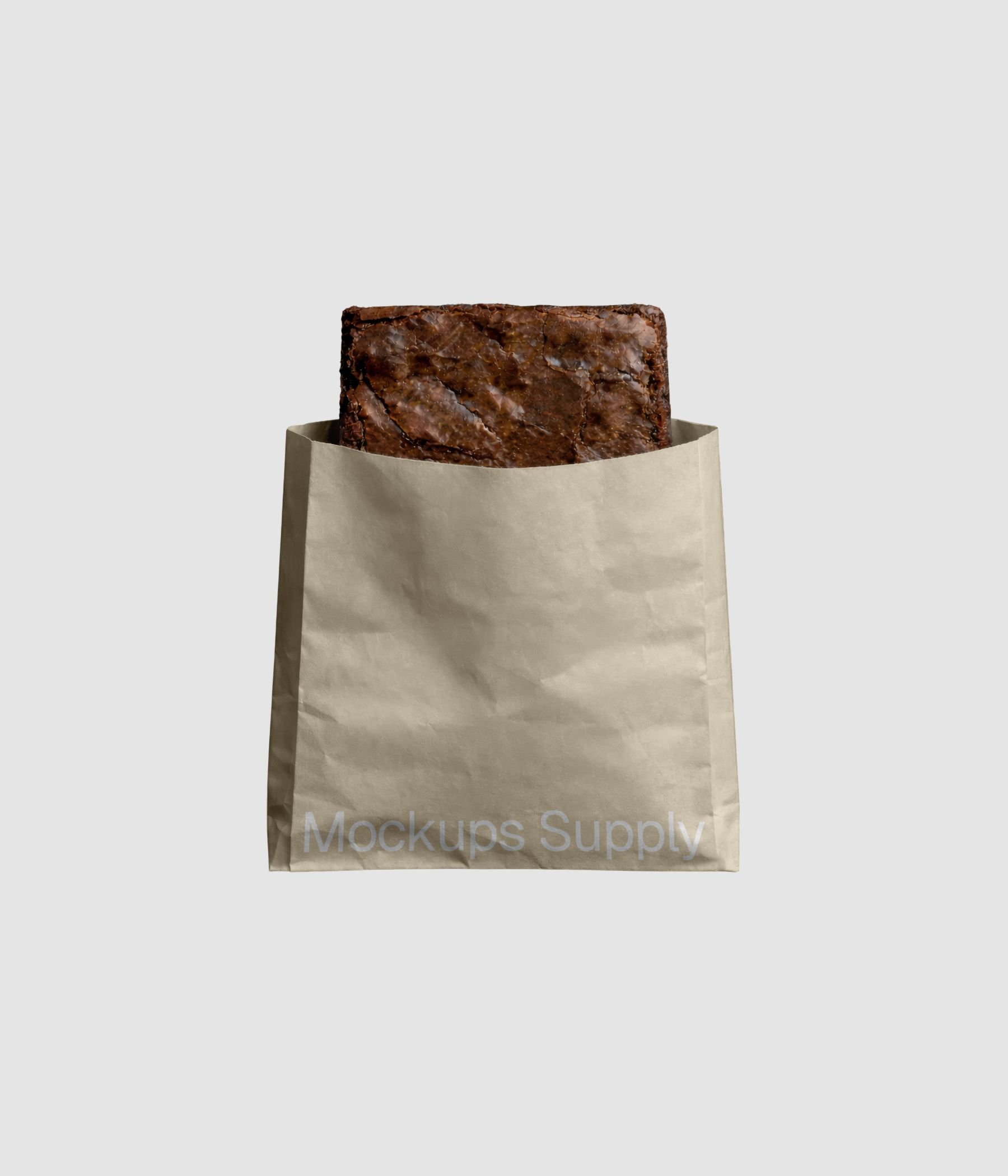 Piece of brownie cake in paper bag mockup PSD showcasing dessert packaging branding