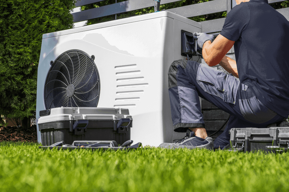 a wall mounted air conditioner mounted on the side of a building