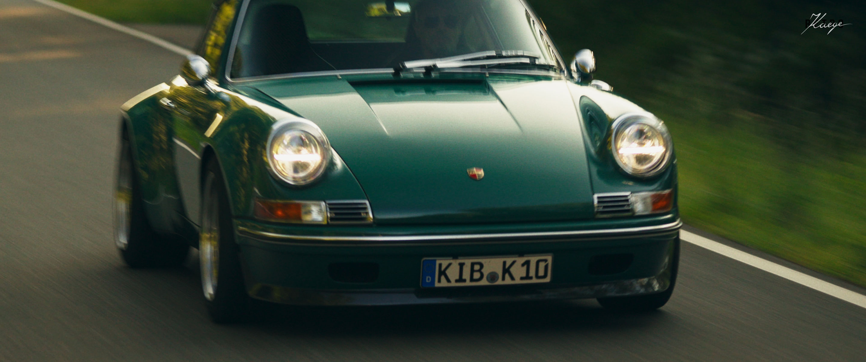 a green retro porsche