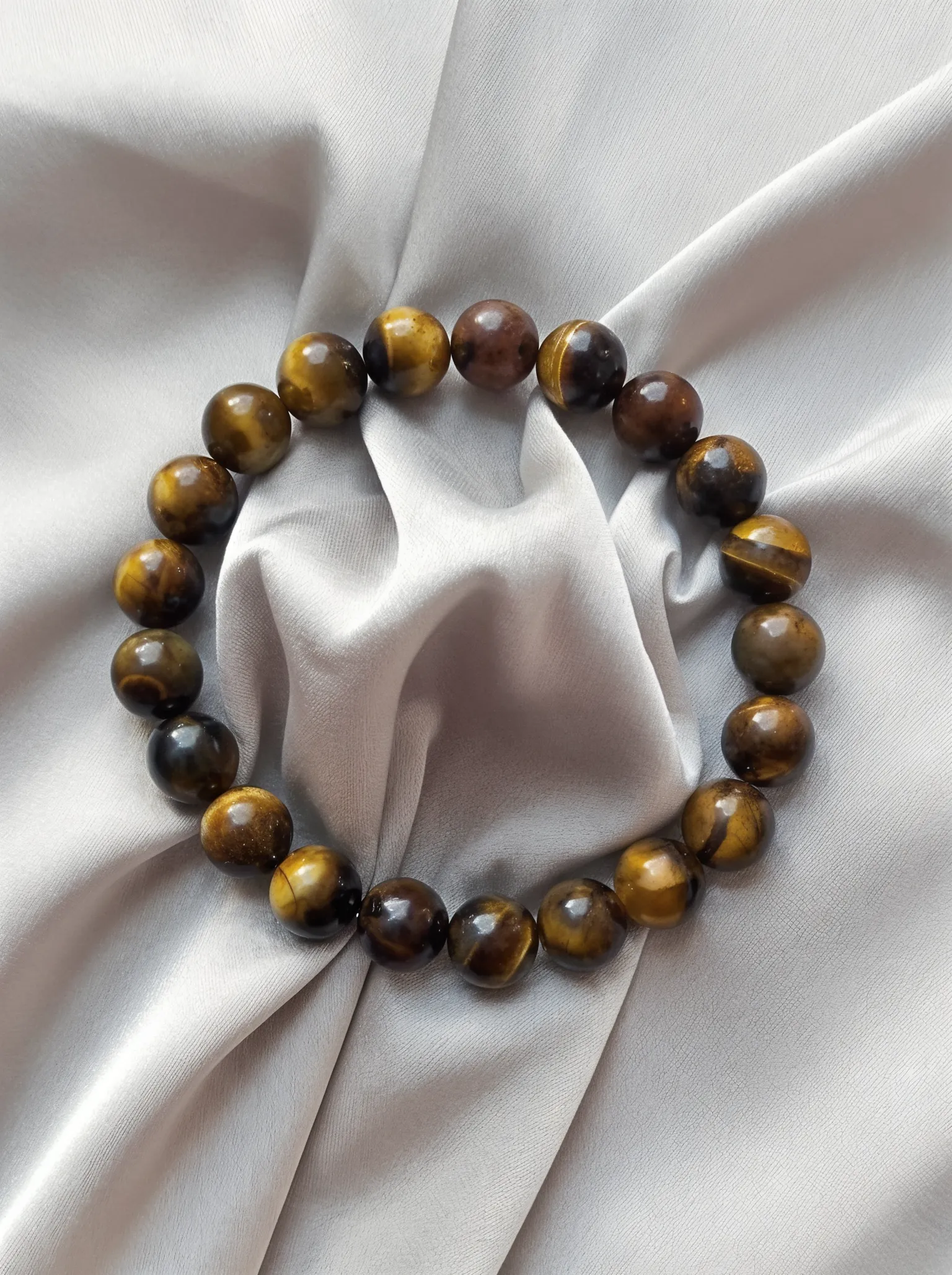 Bracelet placed on a fabric setting.