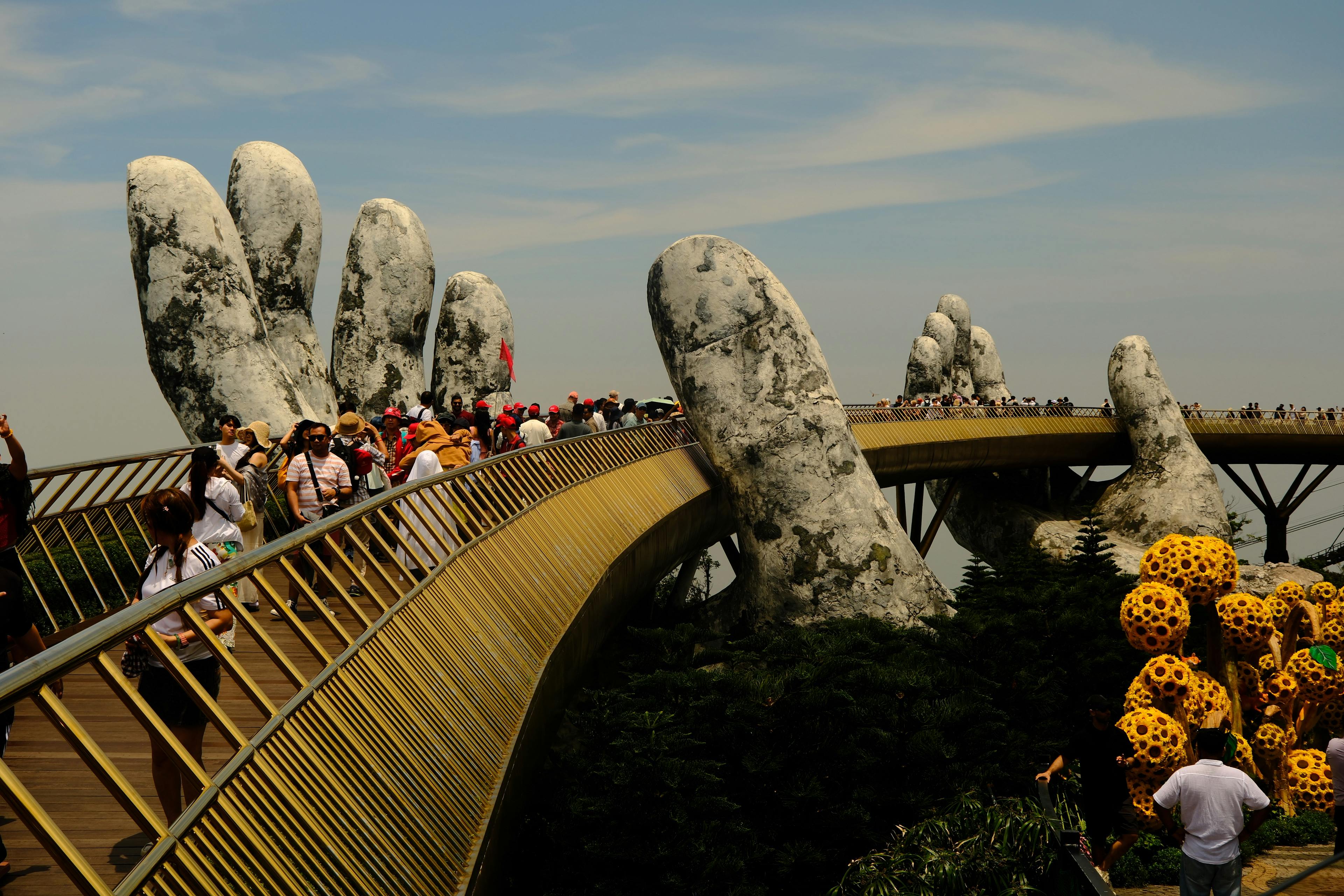 Golden Bridge held by giant stone hands in Da Nang, Vietnam