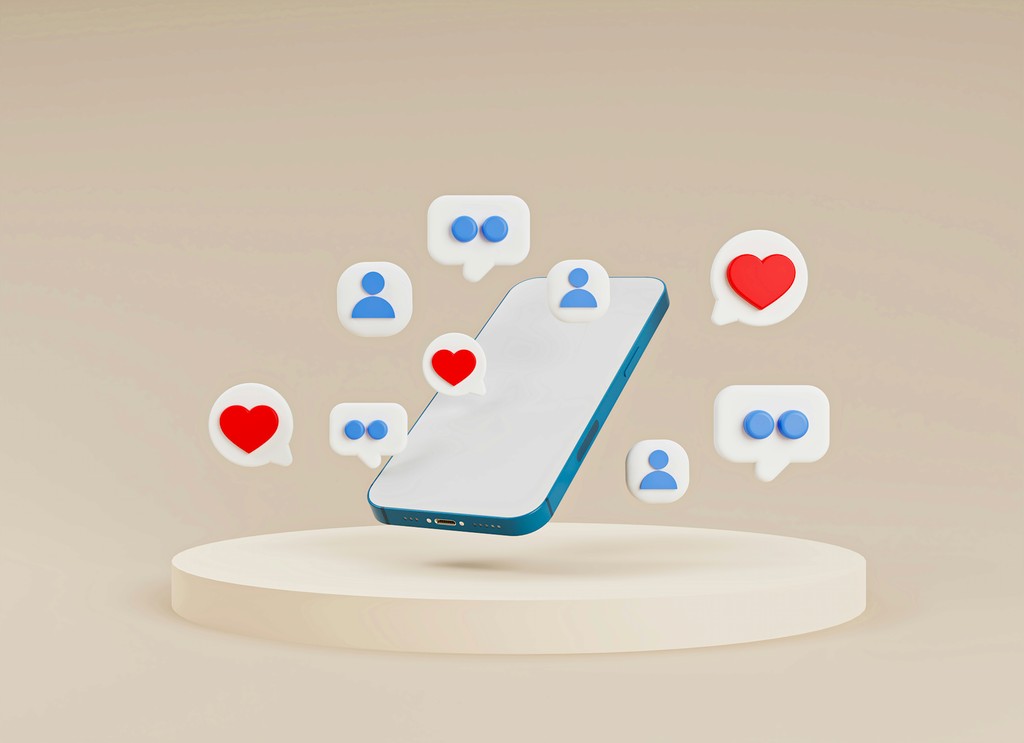 A floating smartphone is surrounded by 3D social media icons, including hearts, chat bubbles, and user profiles, symbolizing the dynamic and interactive nature of online social engagement.