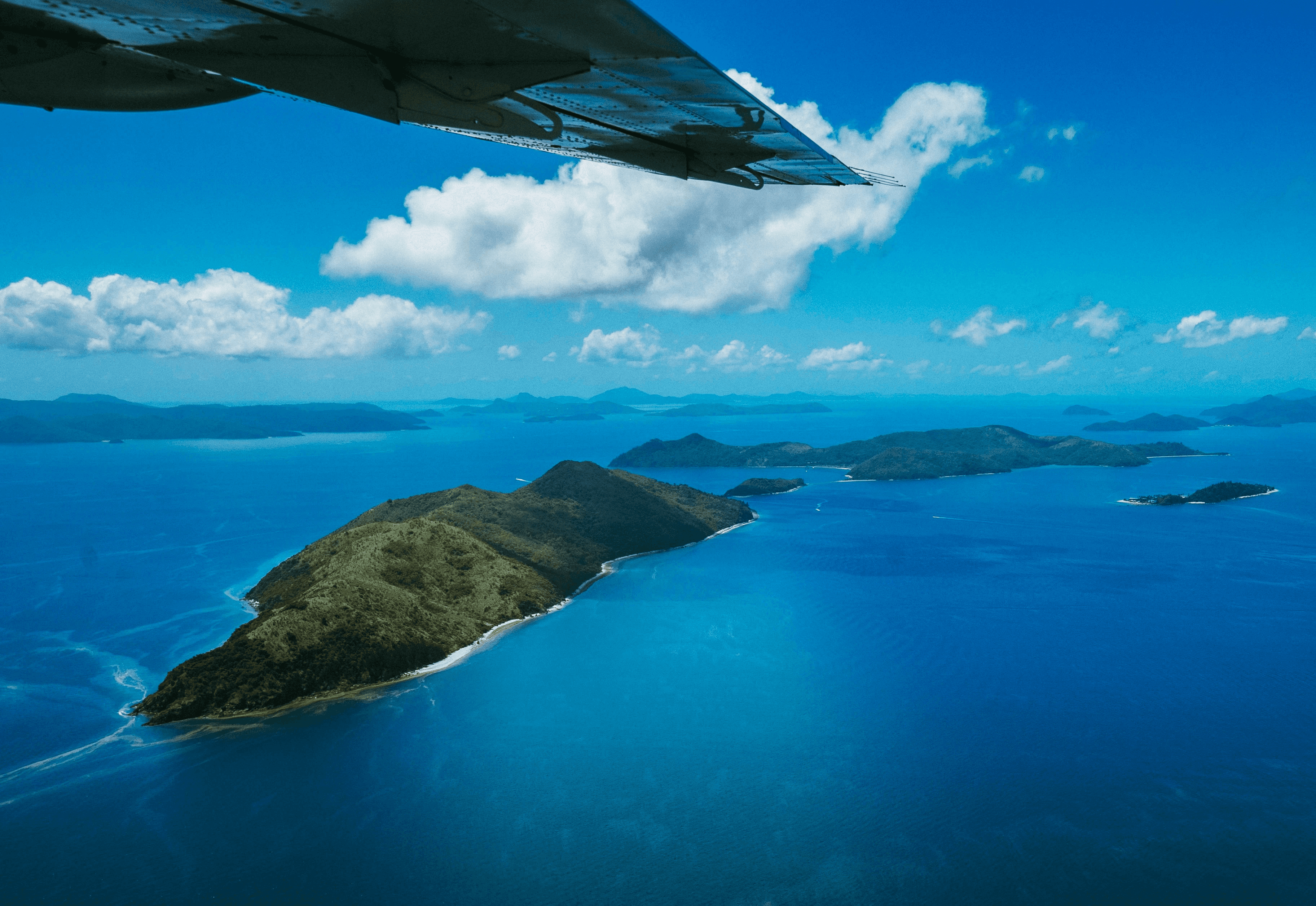 white suv on brown sand