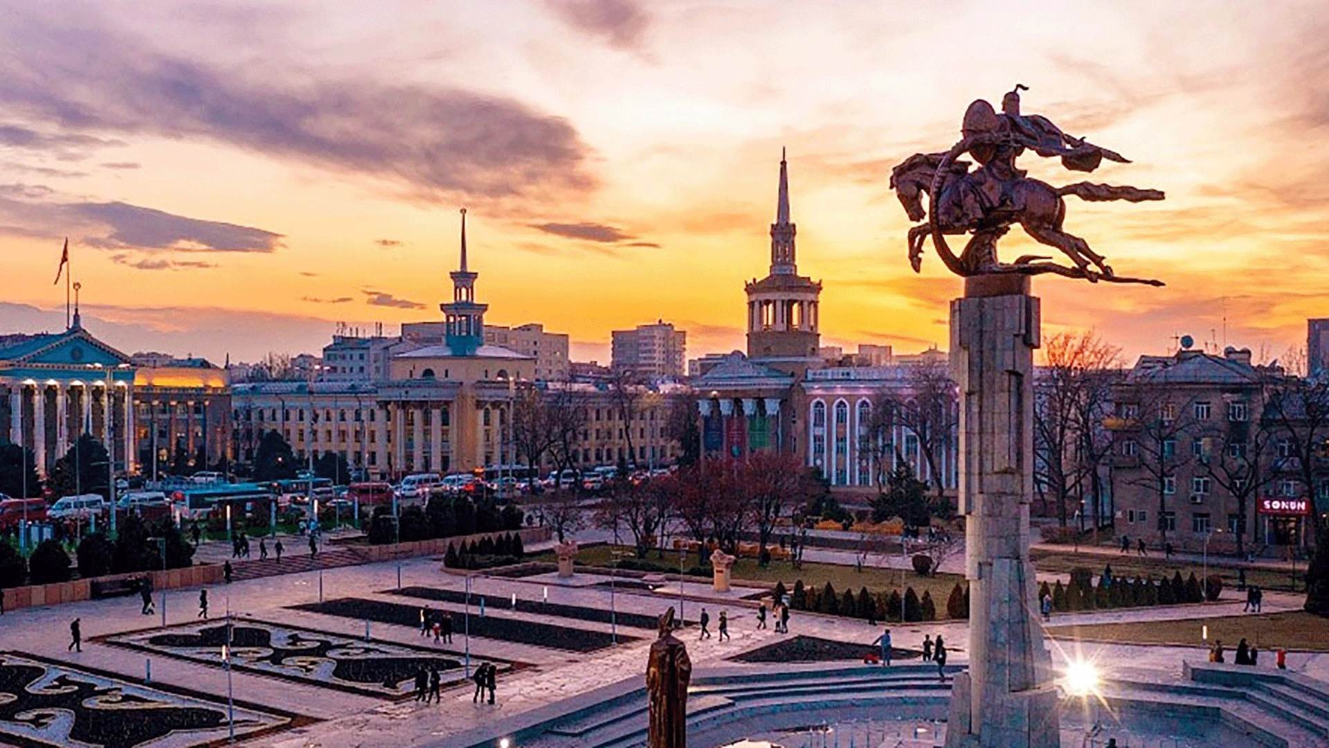 Sunset city square with horse statue