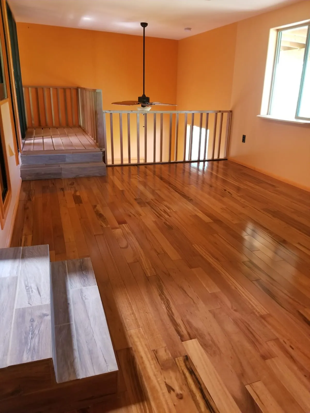 New hardwood flooring in a Tucson living room