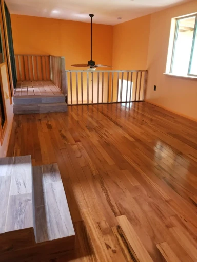 New hardwood flooring in a Tucson living room