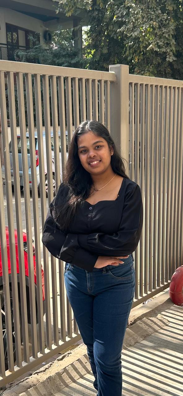 A young man riding a bicycle