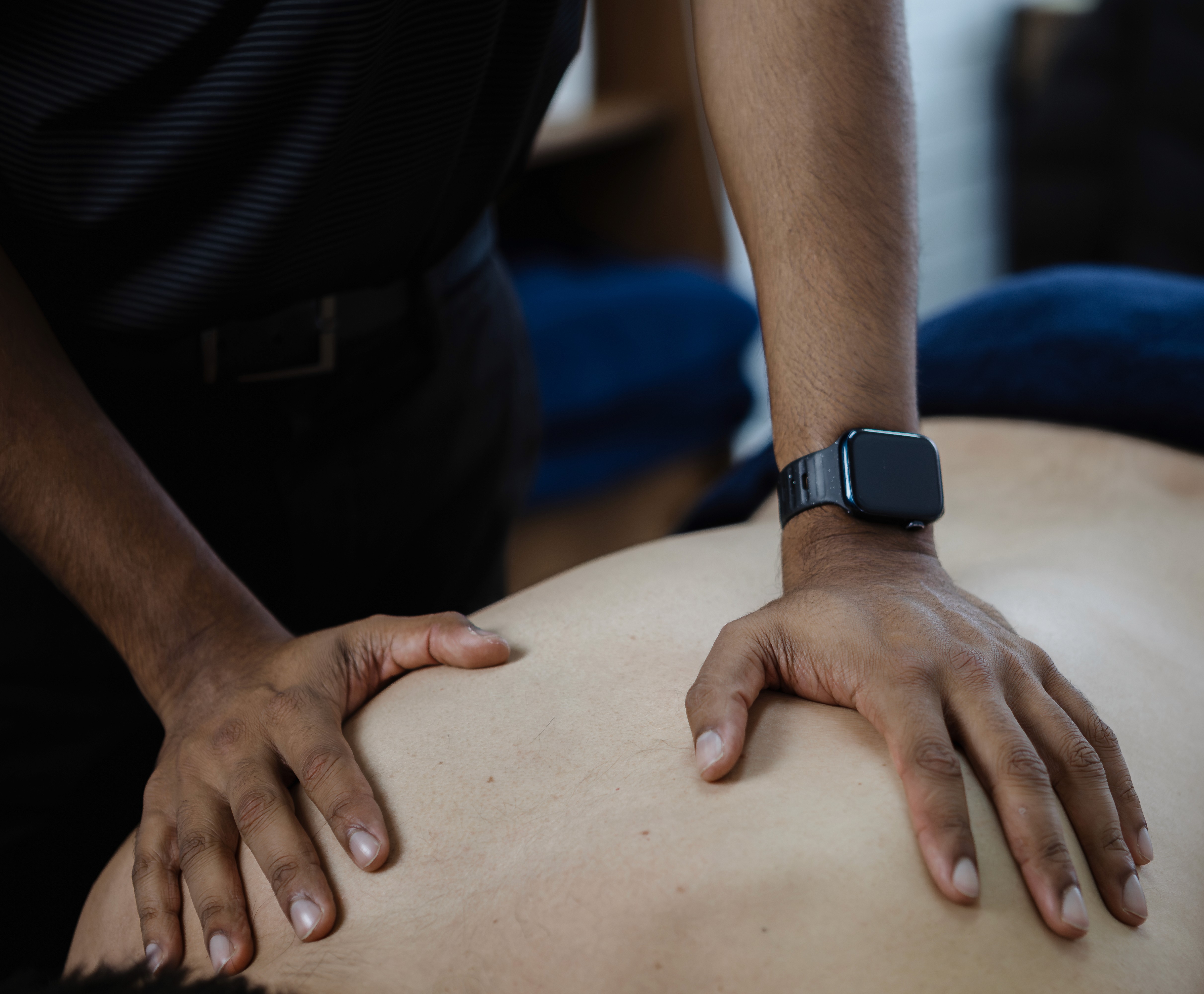 Osteopath performing a sports massage at Nudge Osteopathy