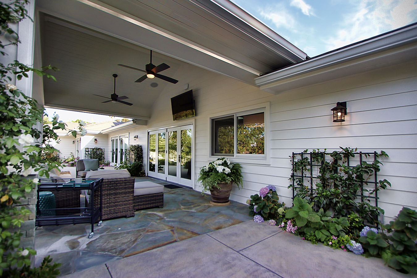 New rear covered porch offering a functional outdoor living space.