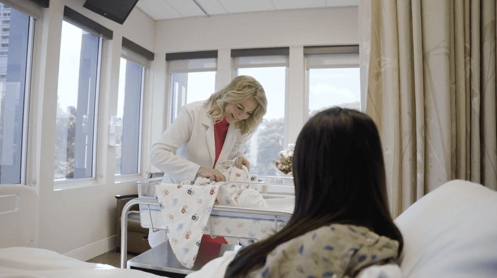 Doctor consulting with patient in exam room