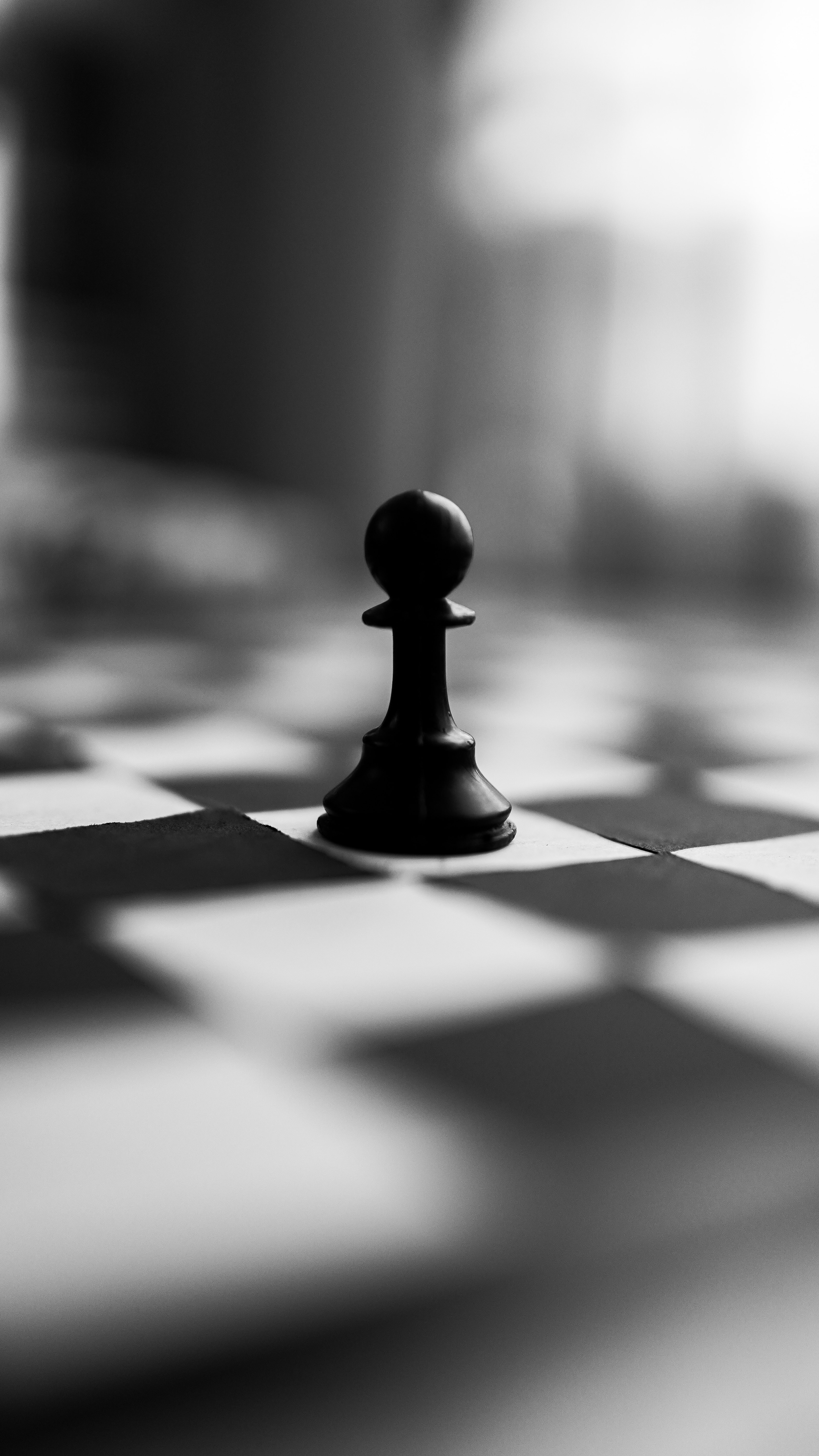 single pawn chess piece on a board