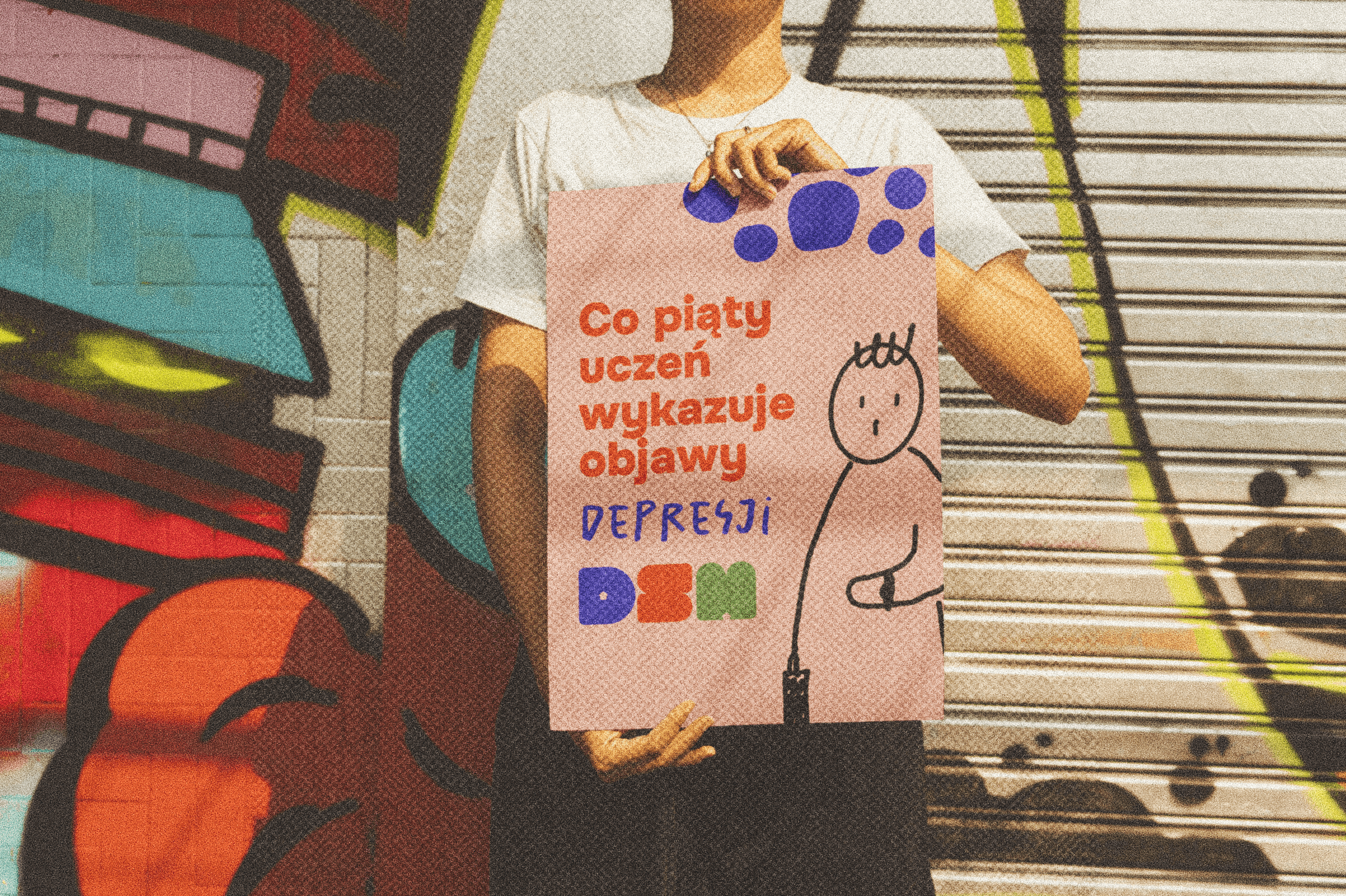 a man holding a cocktail