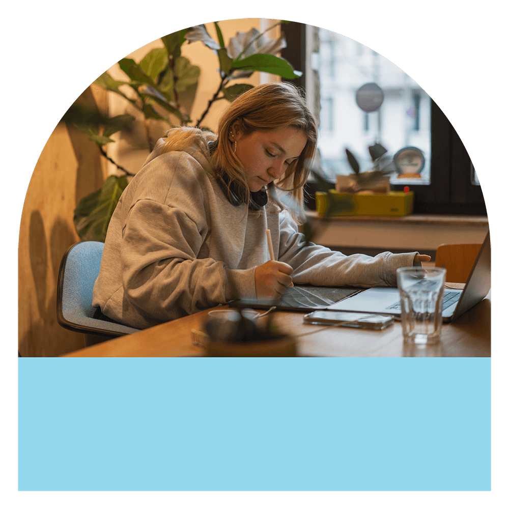 Girl smiling with coffee mug