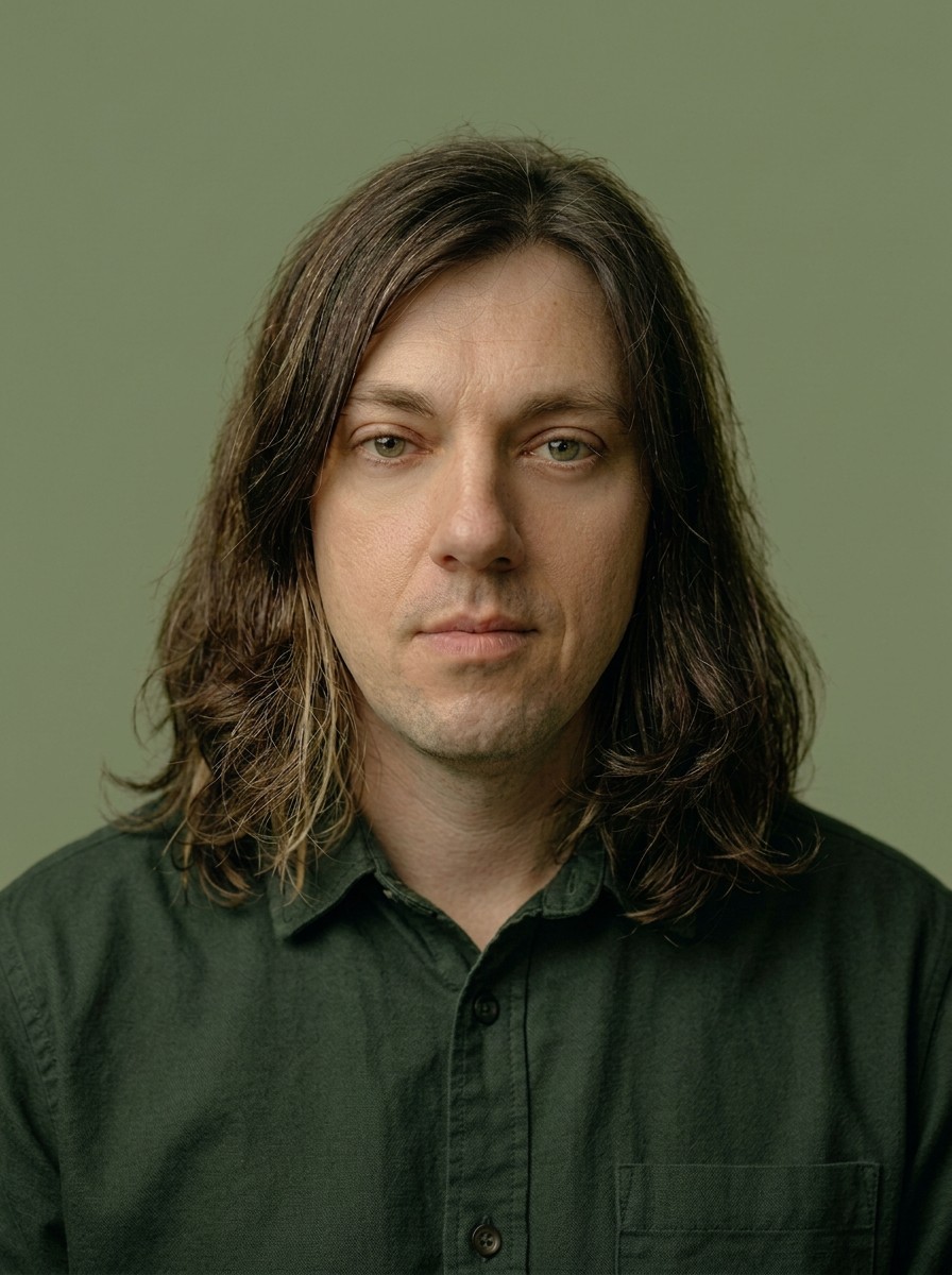 Akos Szep, Client Partner at WeGrow. Portrait photo.