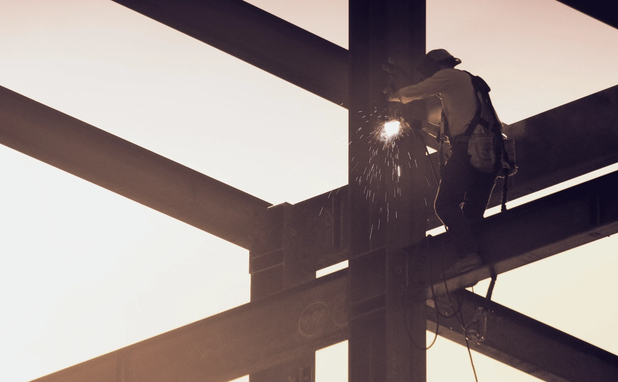 man in black jacket and black helmet standing on top of building during daytime