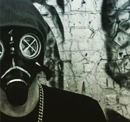 DJ Batwing wearing his signature gas mask.