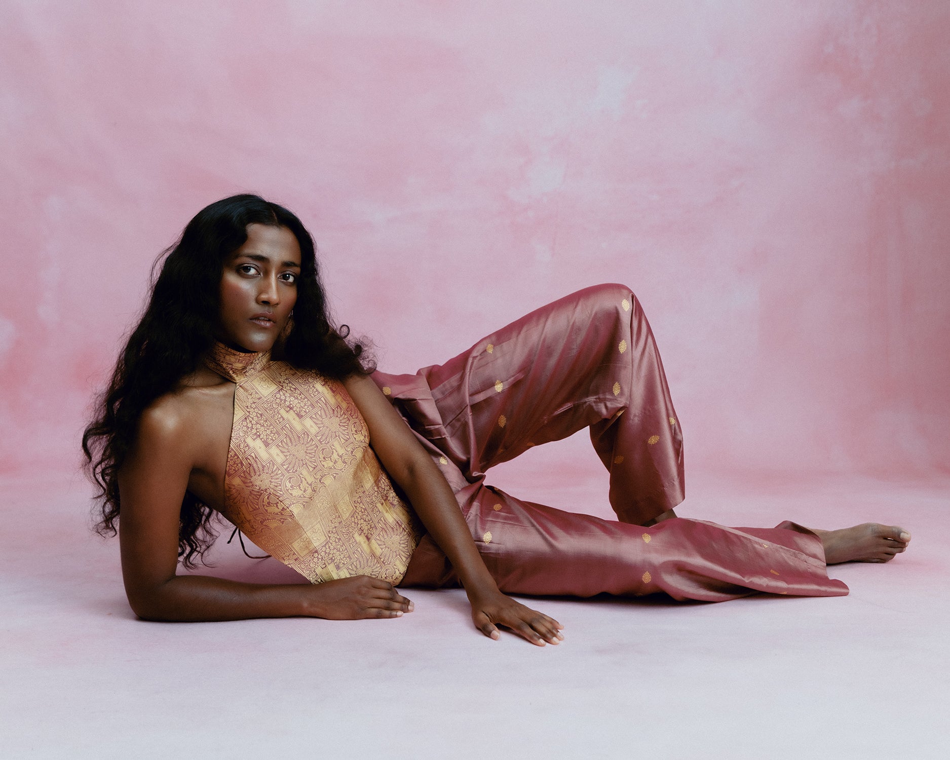 Apsara is our high-neck, backless top crafted from a brocade vintage silk saree, inhouse by skilled artisans. 