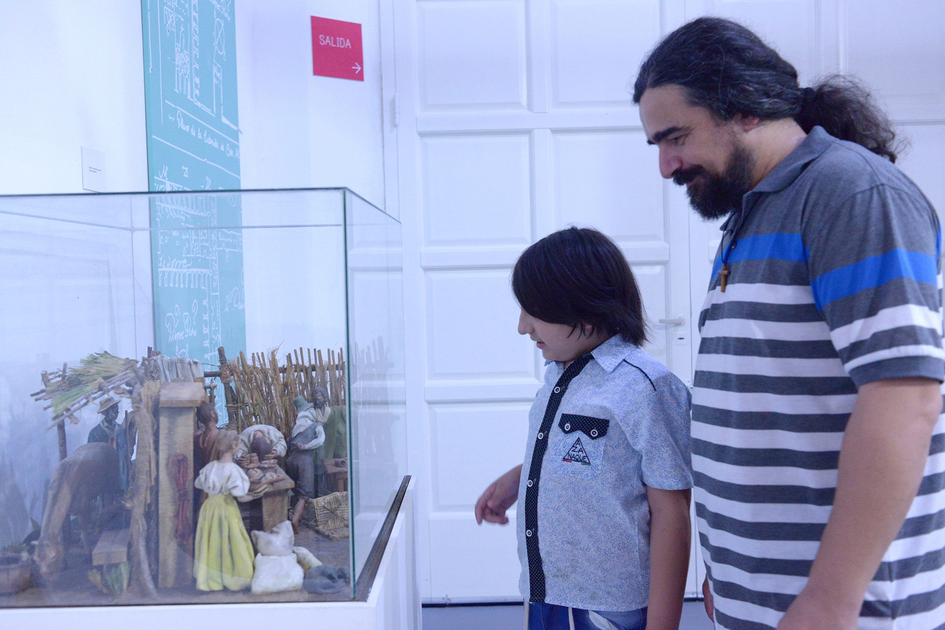 Interior of a cafe or workspace with several people at tables