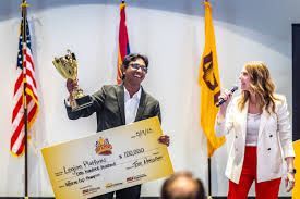 a black and white living room with a large tv
