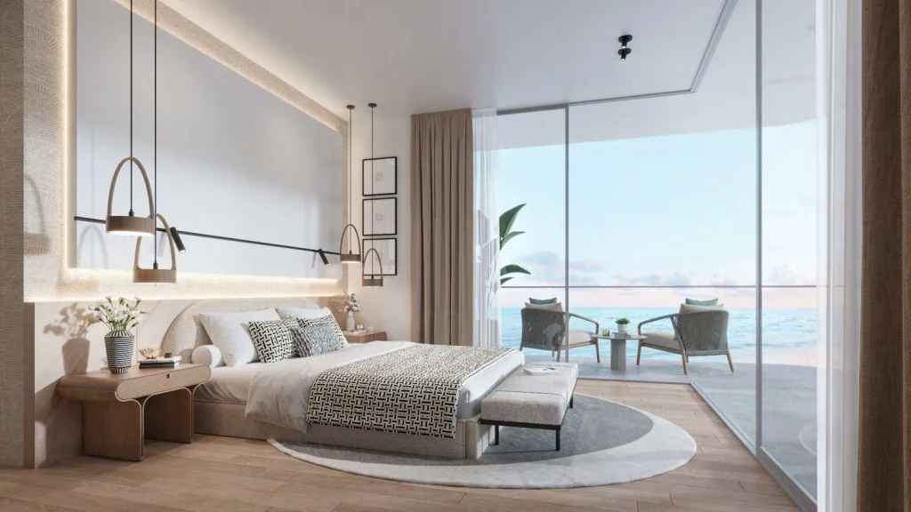 A modern bedroom featuring large windows with a stunning view of the ocean in Passo, Dubai.