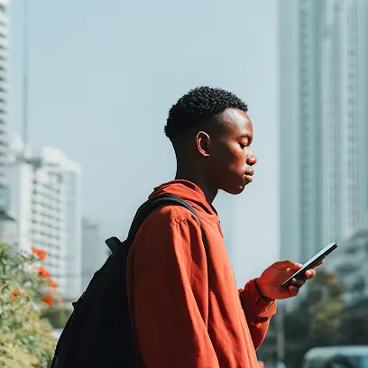 A young woman with braided hair in a desert