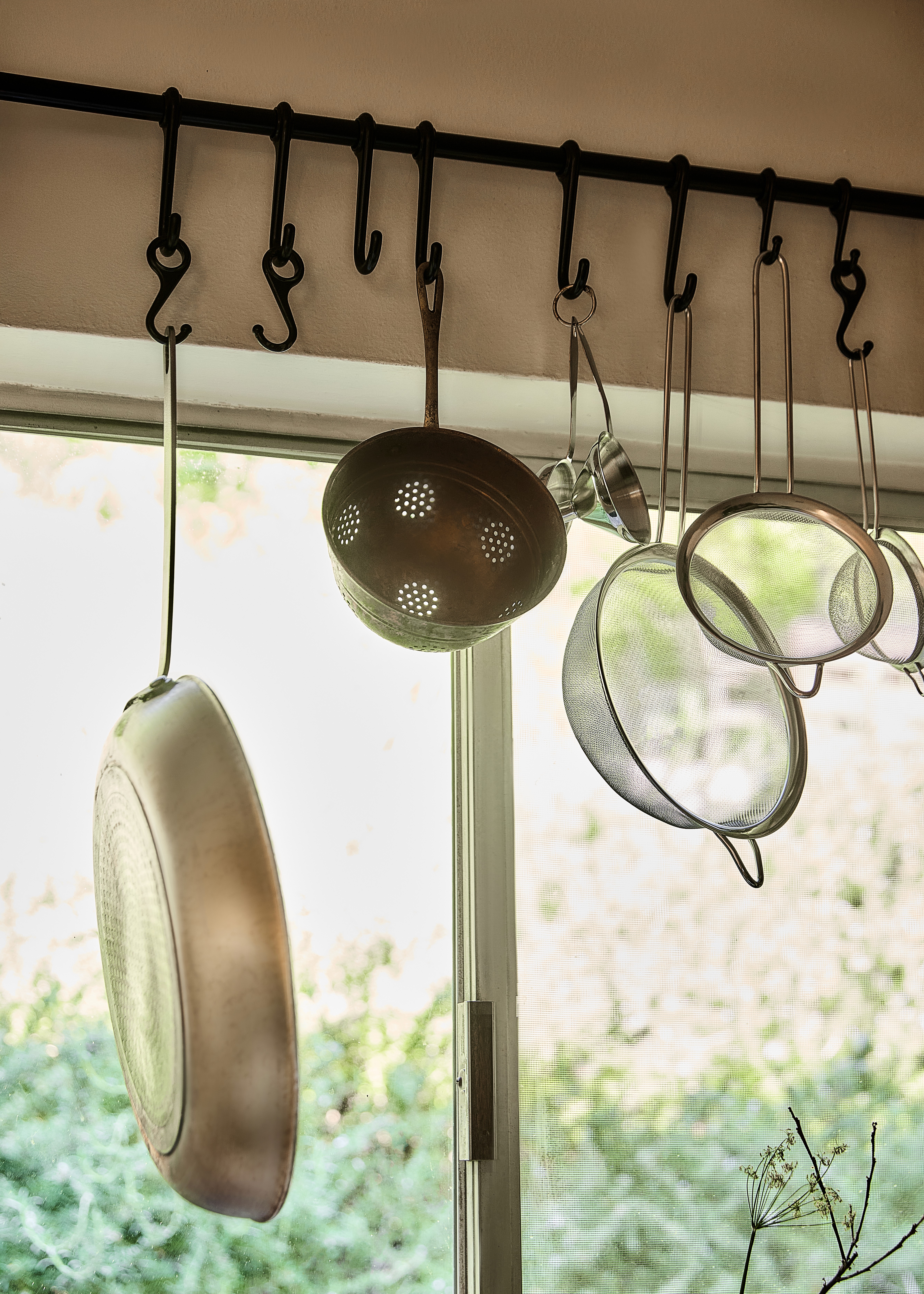 Woman walking on a curved pavement with shadow.