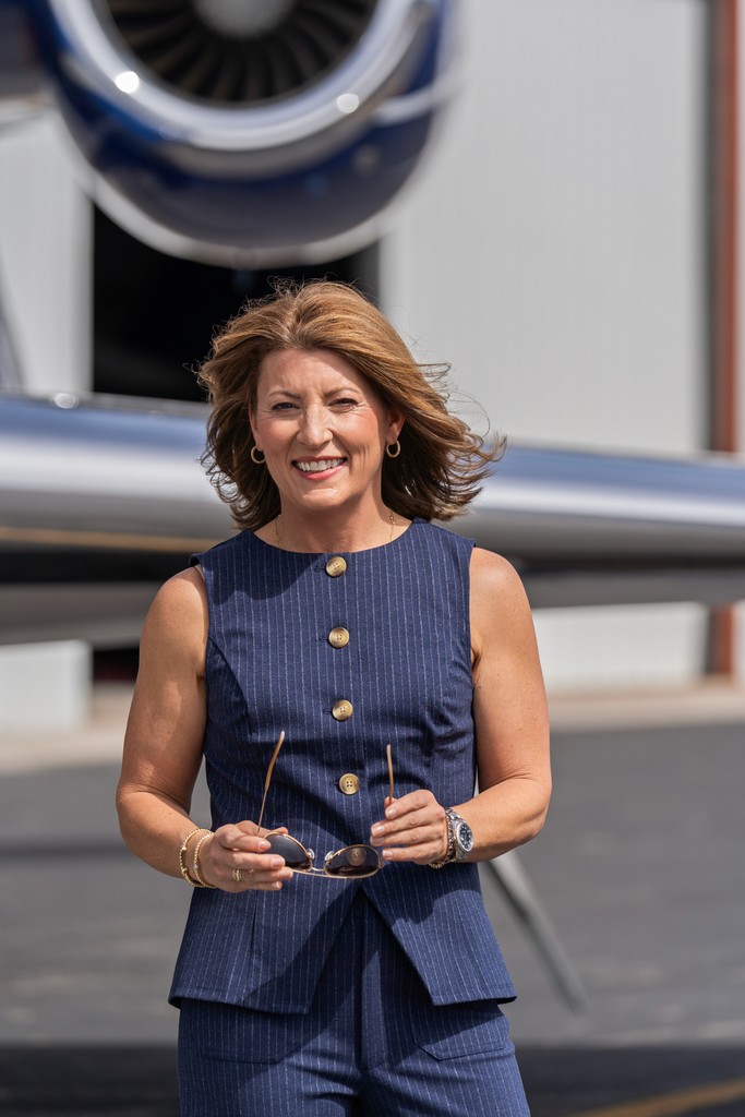 person sitting in a chair in front of a man