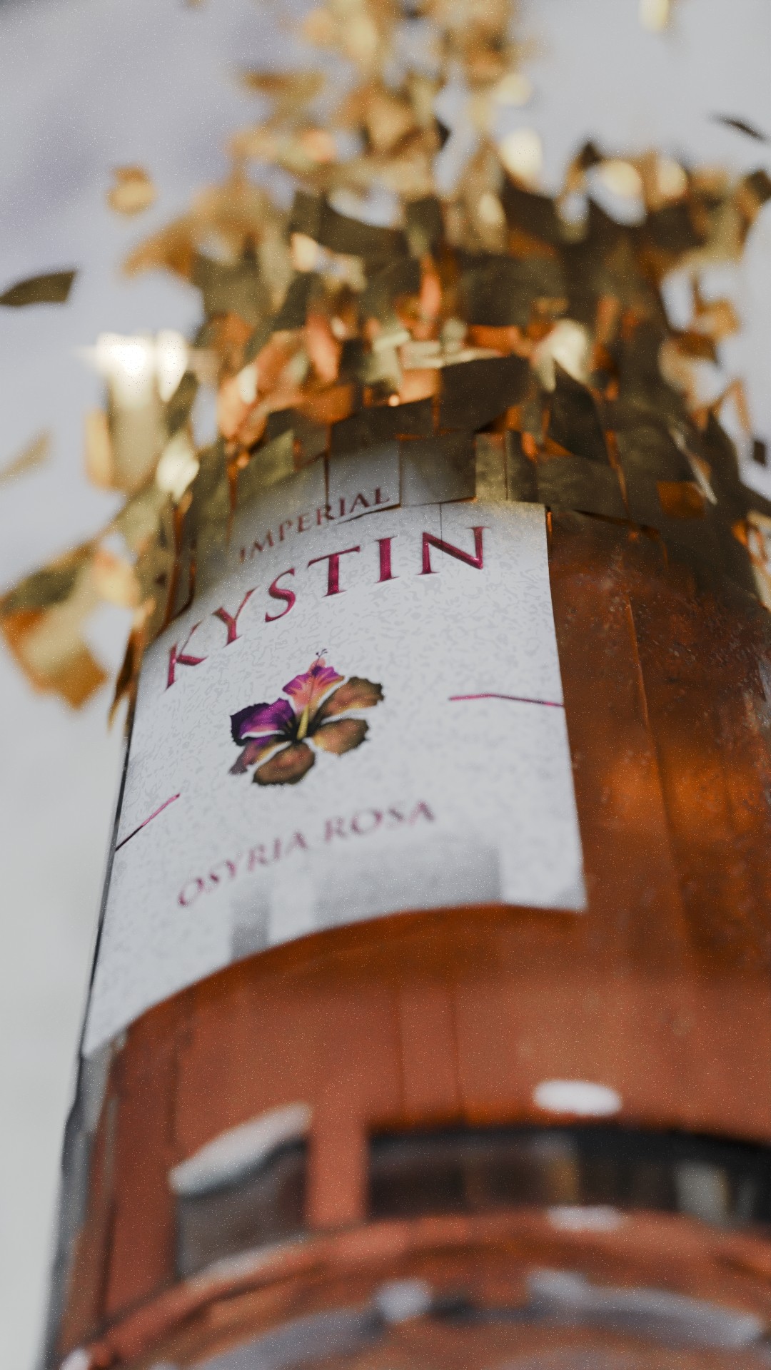 Etiquette d'une bouteille Kystin qui se dissolve en particules d'or