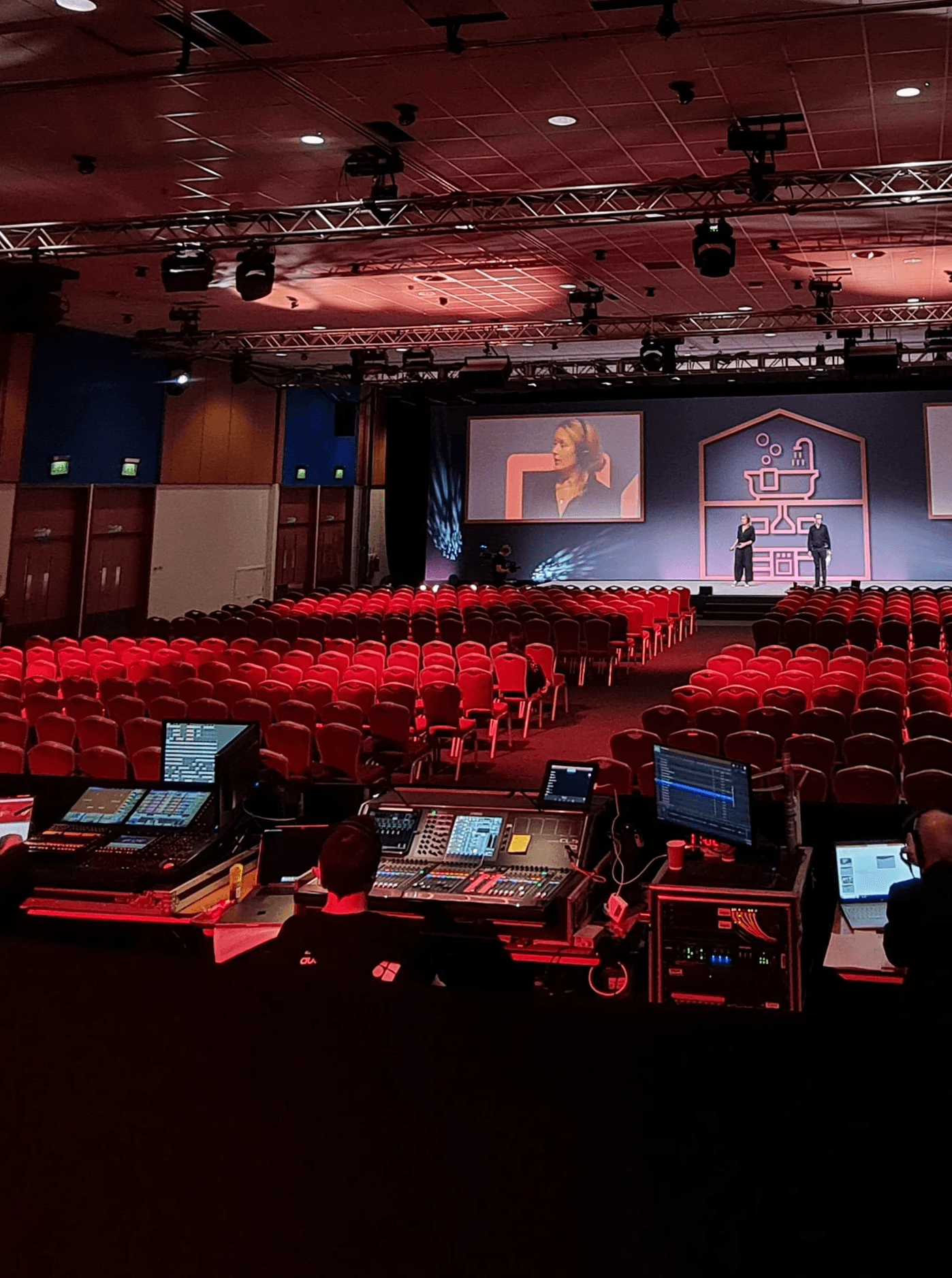 selective photo of camera with tripod and laptop computer turned on