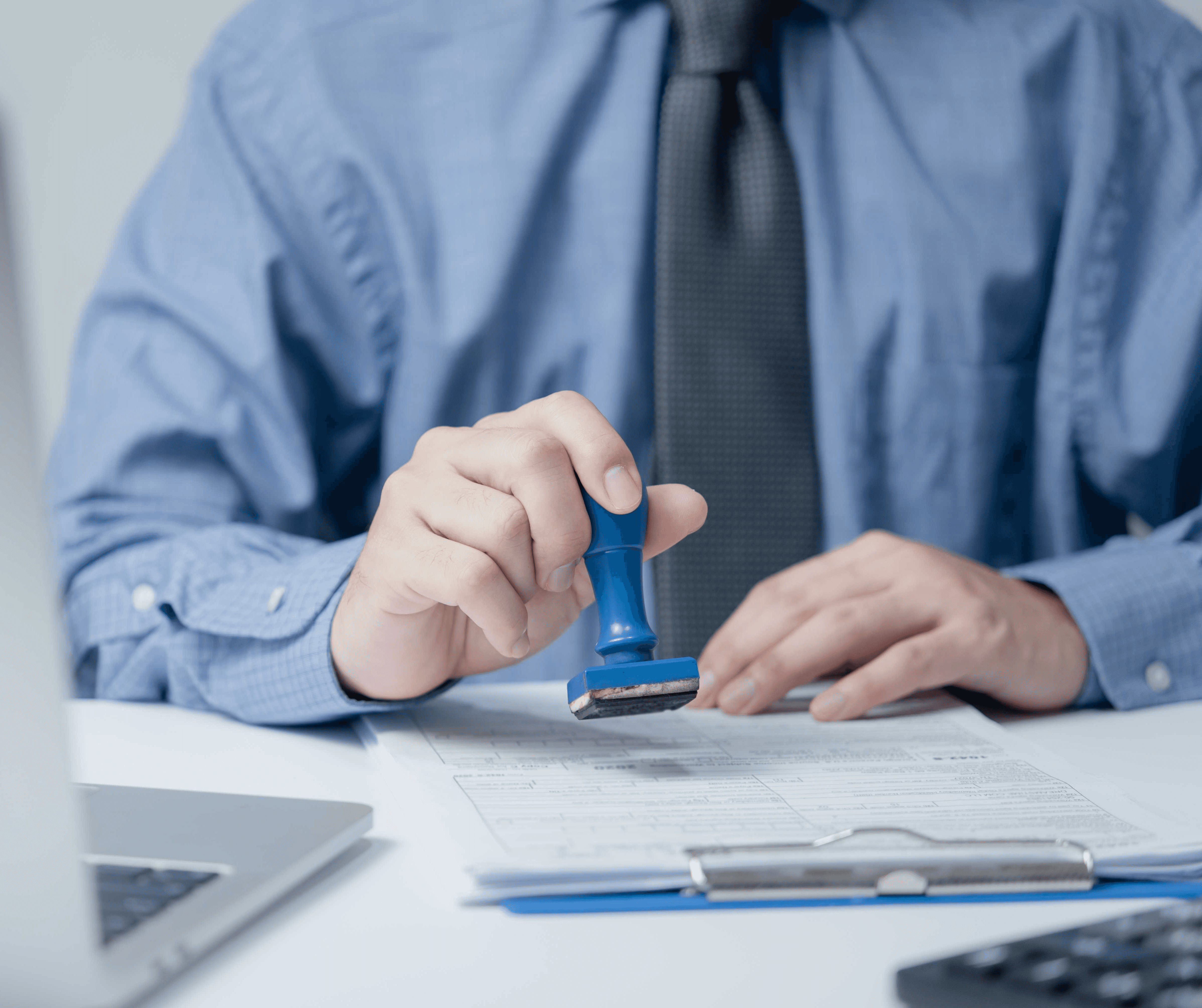 Trusted PRO services Dubai with a businessman reviewing and processing documents, ensuring compliance approvals and accuracy.