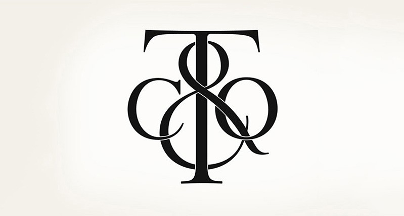 T & CO logo