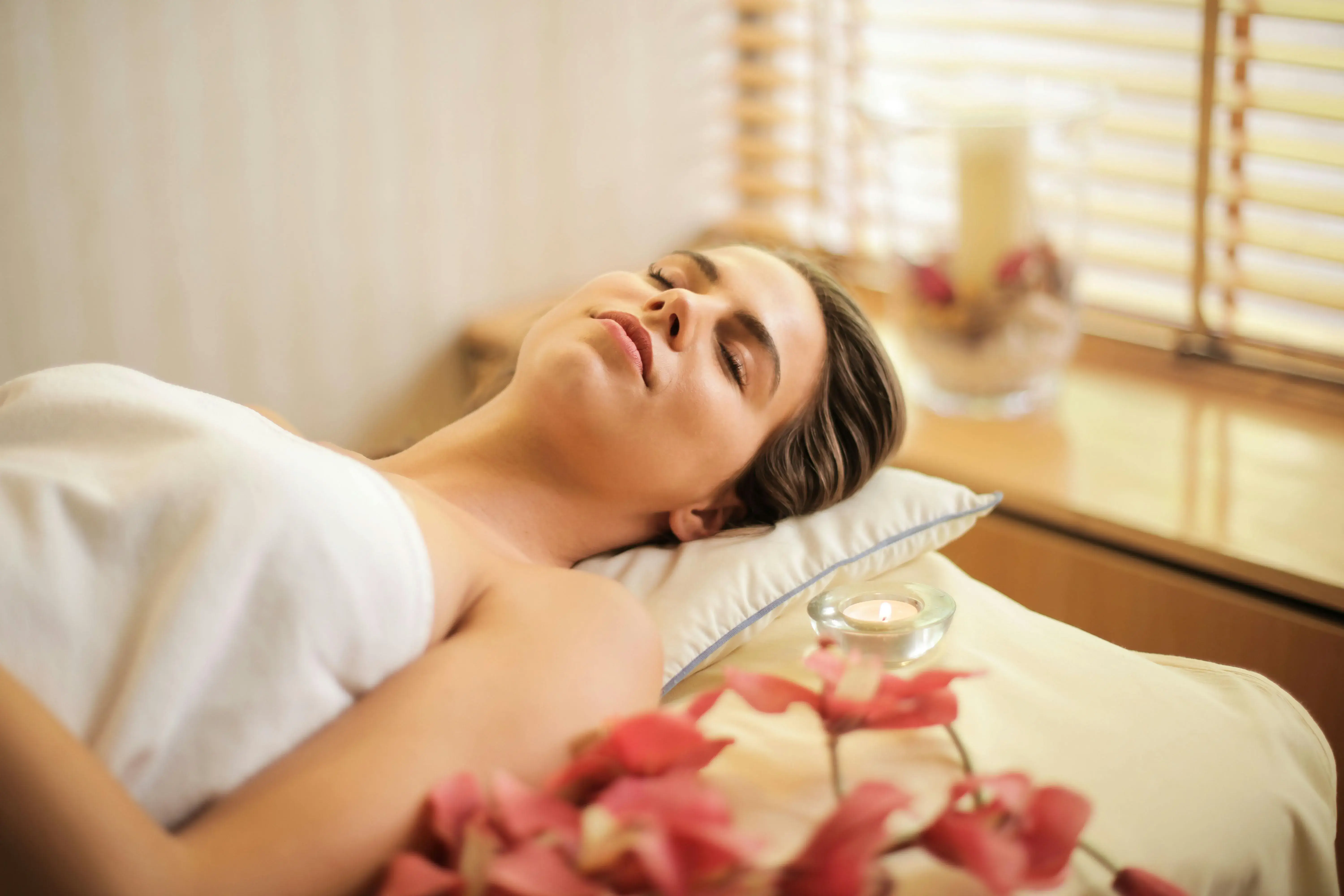 Woman relaxing before injectable or PRP treatment designed to smooth wrinkles, restore facial volume, and boost collagen naturally.