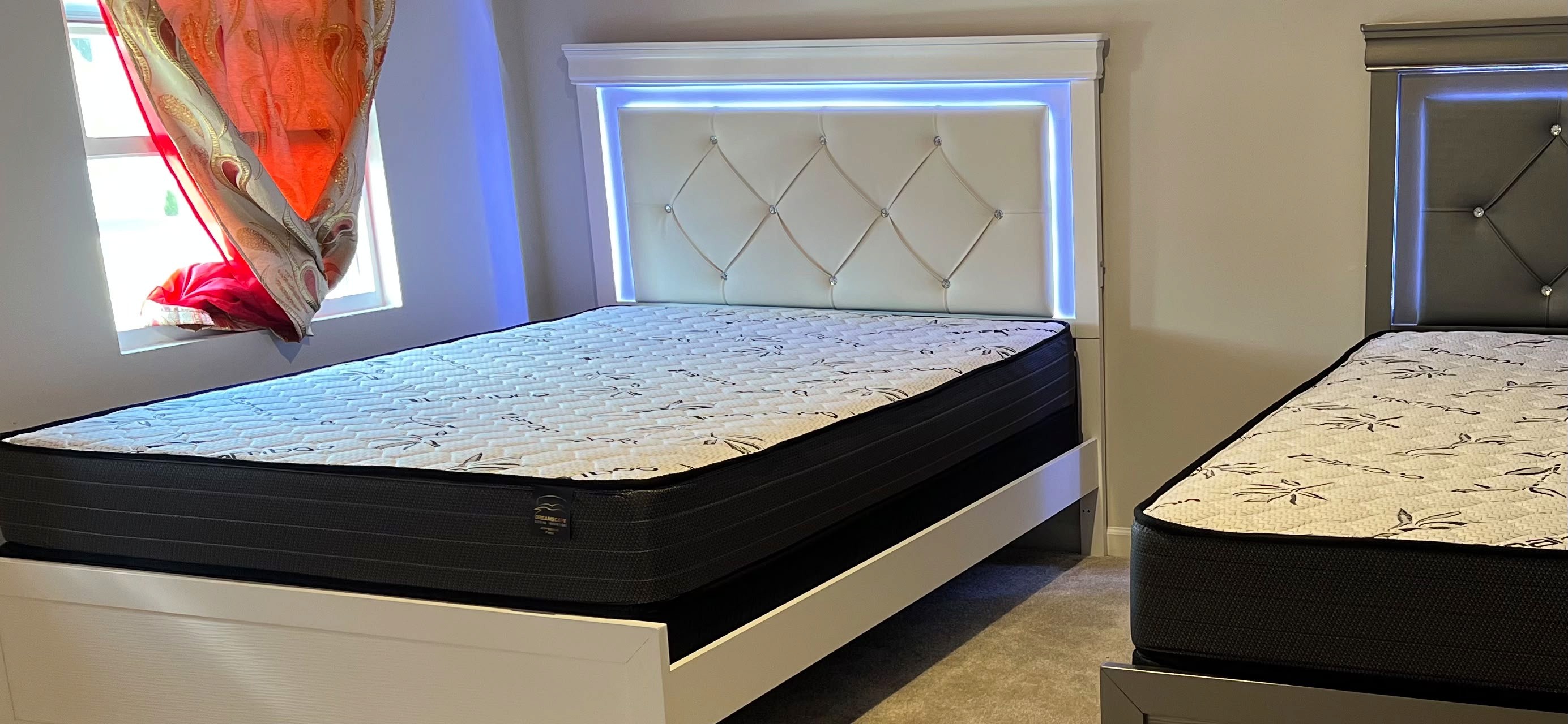 Showroom display of multiple mattresses