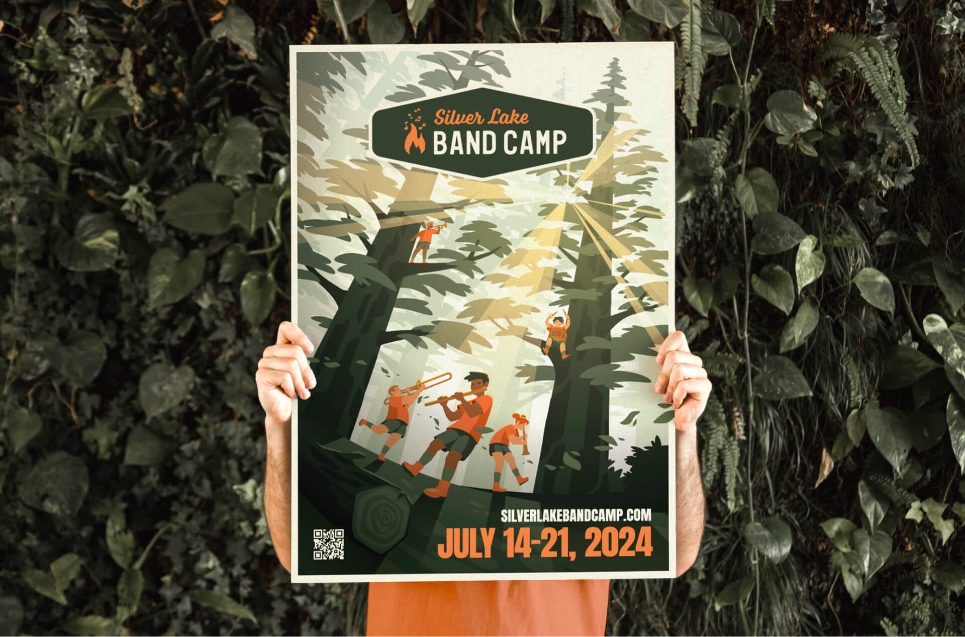 a person holding up an 11x17 size poster promoting silver lake band camp
