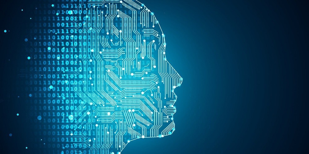 Side profile silhouette of a human head composed of glowing blue circuit board traces and binary code data bits on a dark digital background