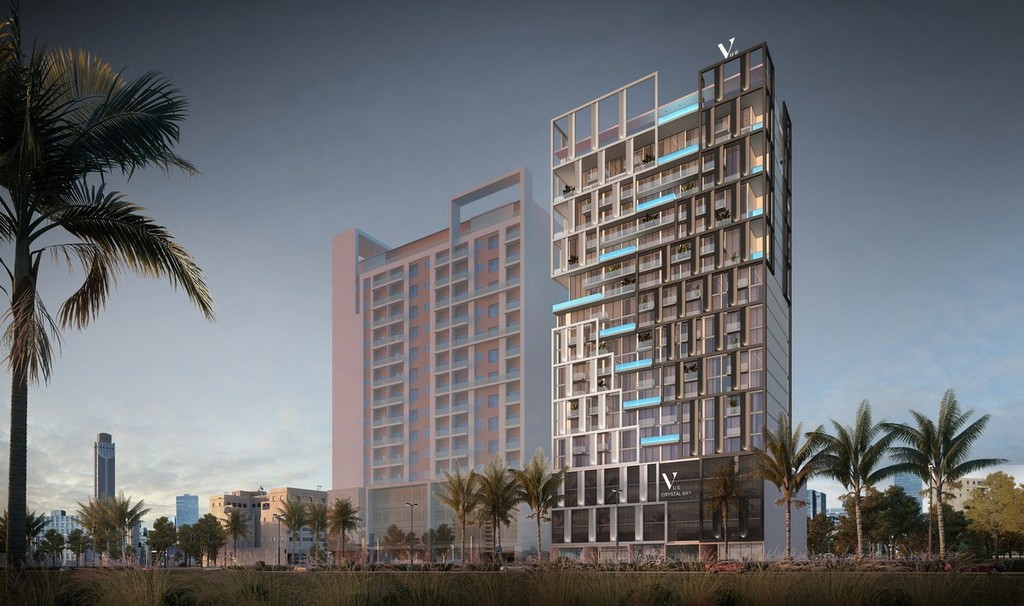 The tallest building in Dubai, Vue Doree Crystal Bay, showcasing its impressive height against a clear blue sky.