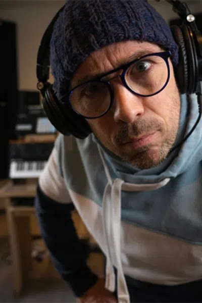 Music producer sitting in his studio