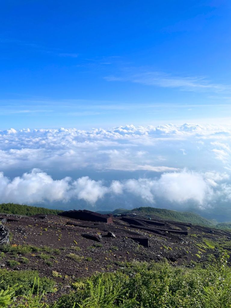 View over the clouds from Mount Fuji