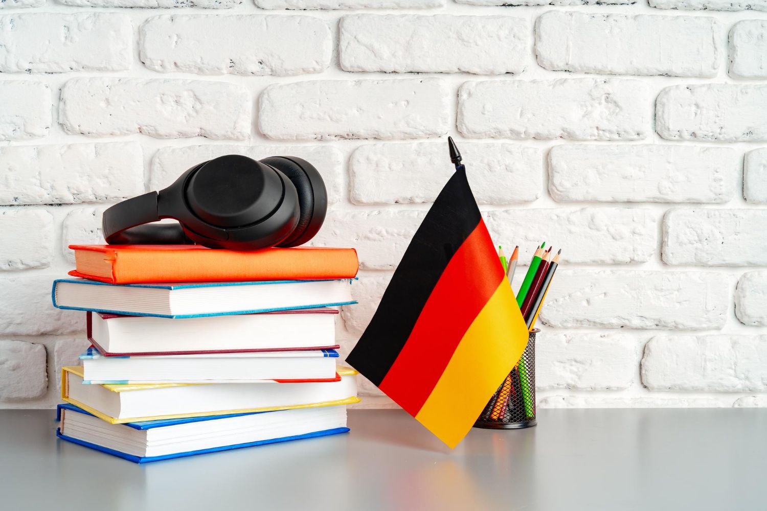 German flag with books - Best Program to Learn German