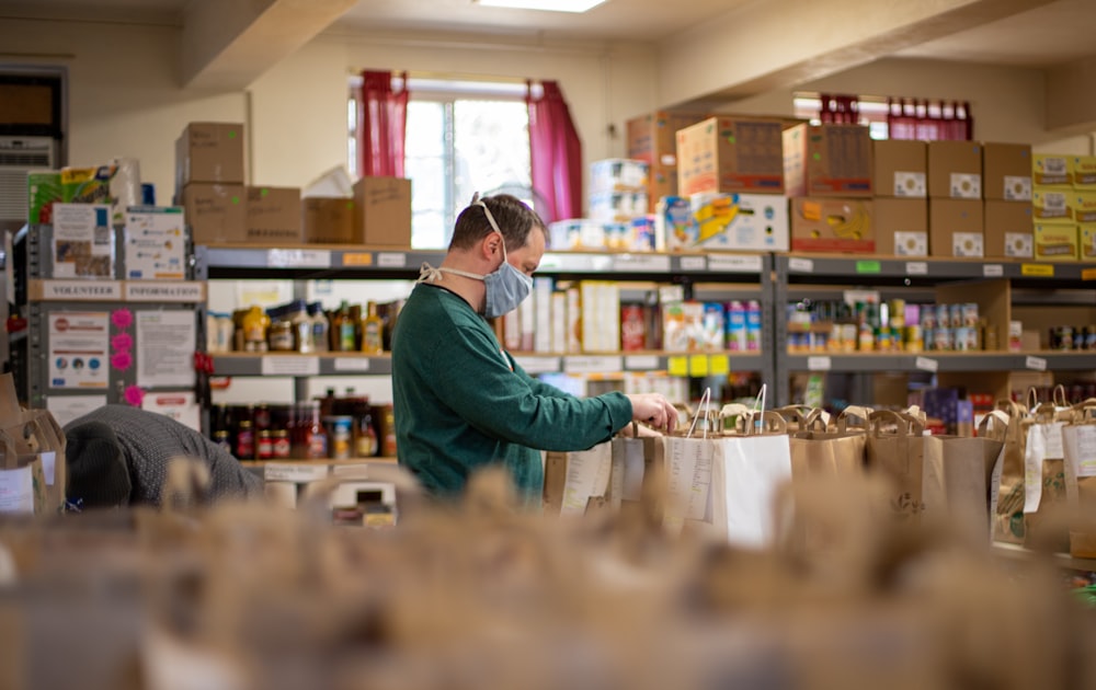 Volunteer sorting supplies at a food bank