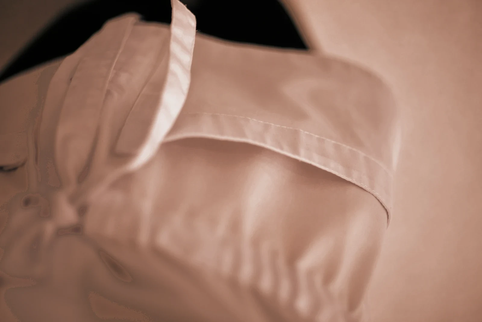 A crisp white shirt collar