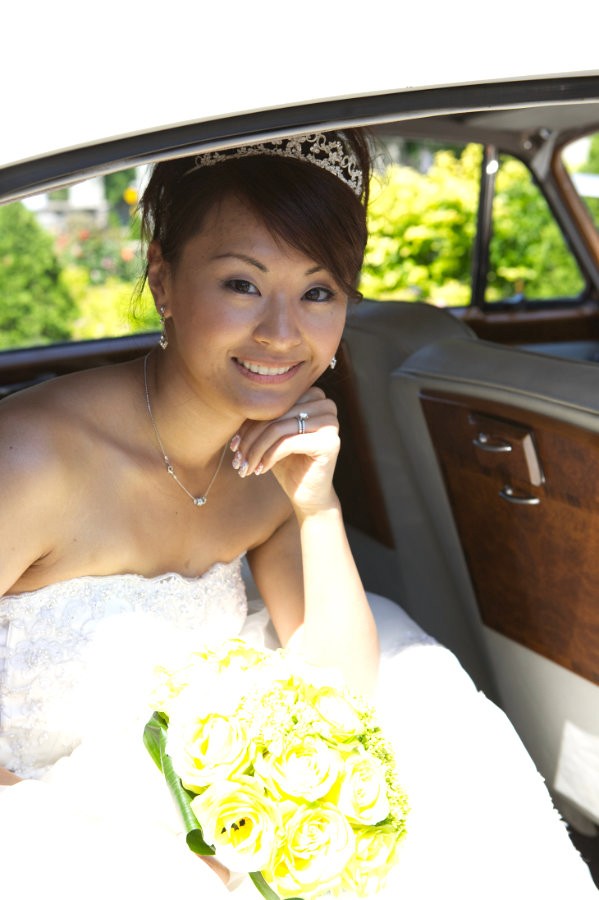 Bride smiling at camera.