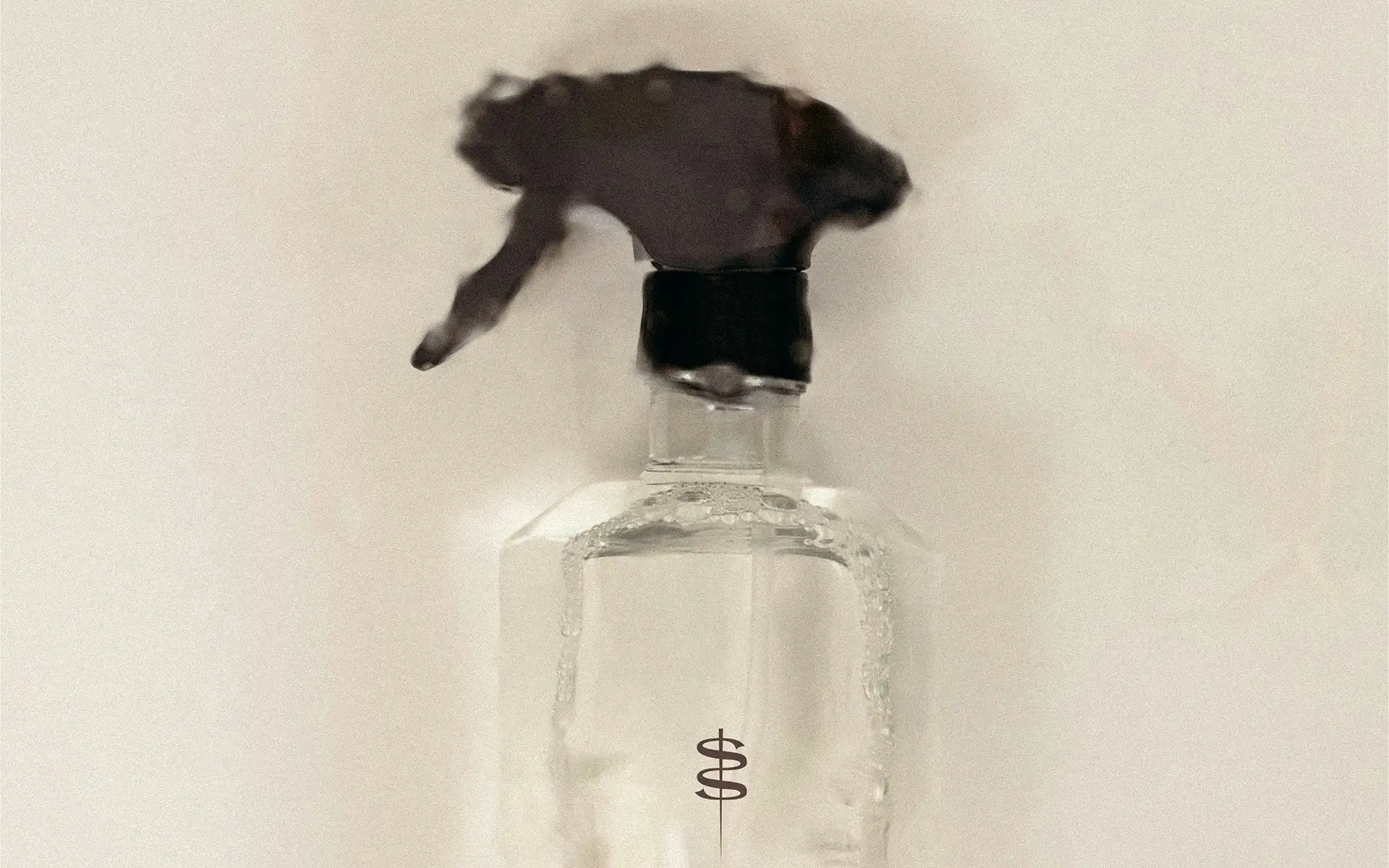 Kanzashi jewelry brand logomark applied to branded product packaging showing submark on glass bottle